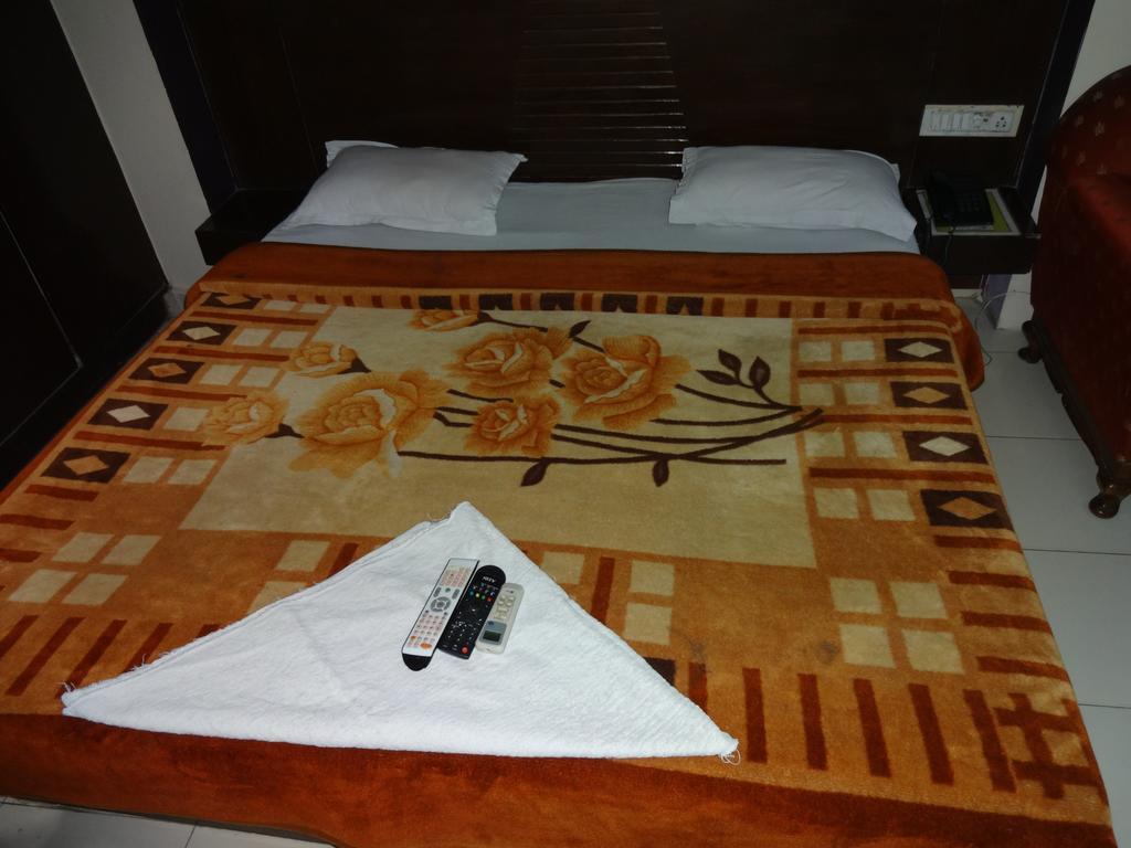 Hotel Elegant International New Delhi Rum bild